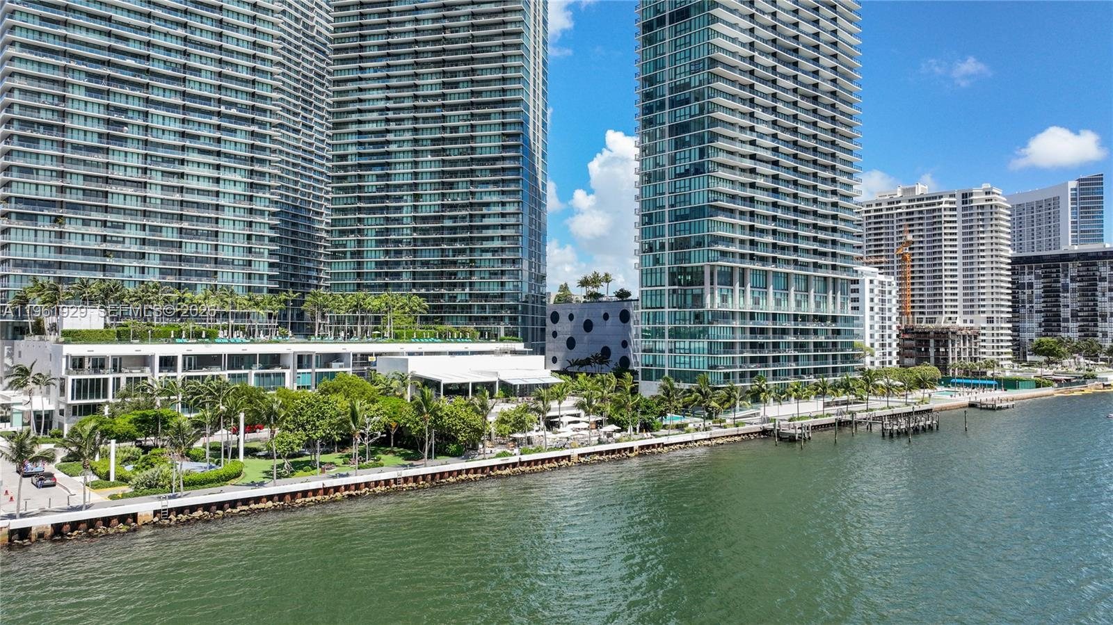 The bayfront pool deck at the foot of the towers