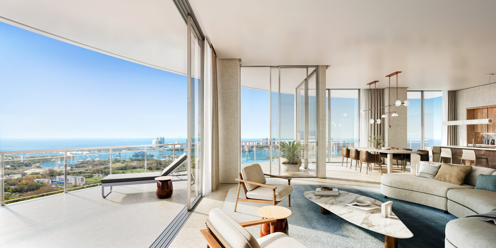 Residence living room opening to the wraparound terrace