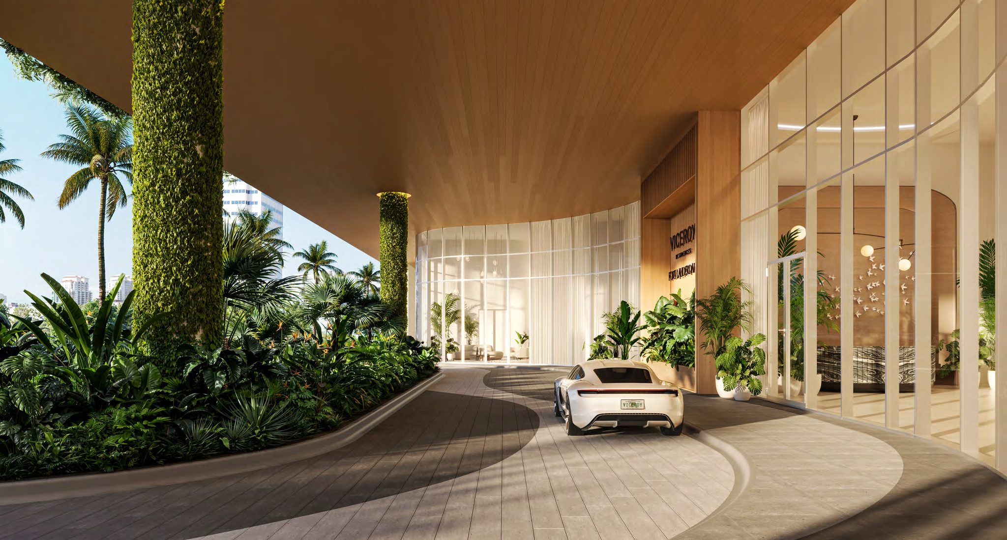 Porte-cochère arrival with landscaped gardens
